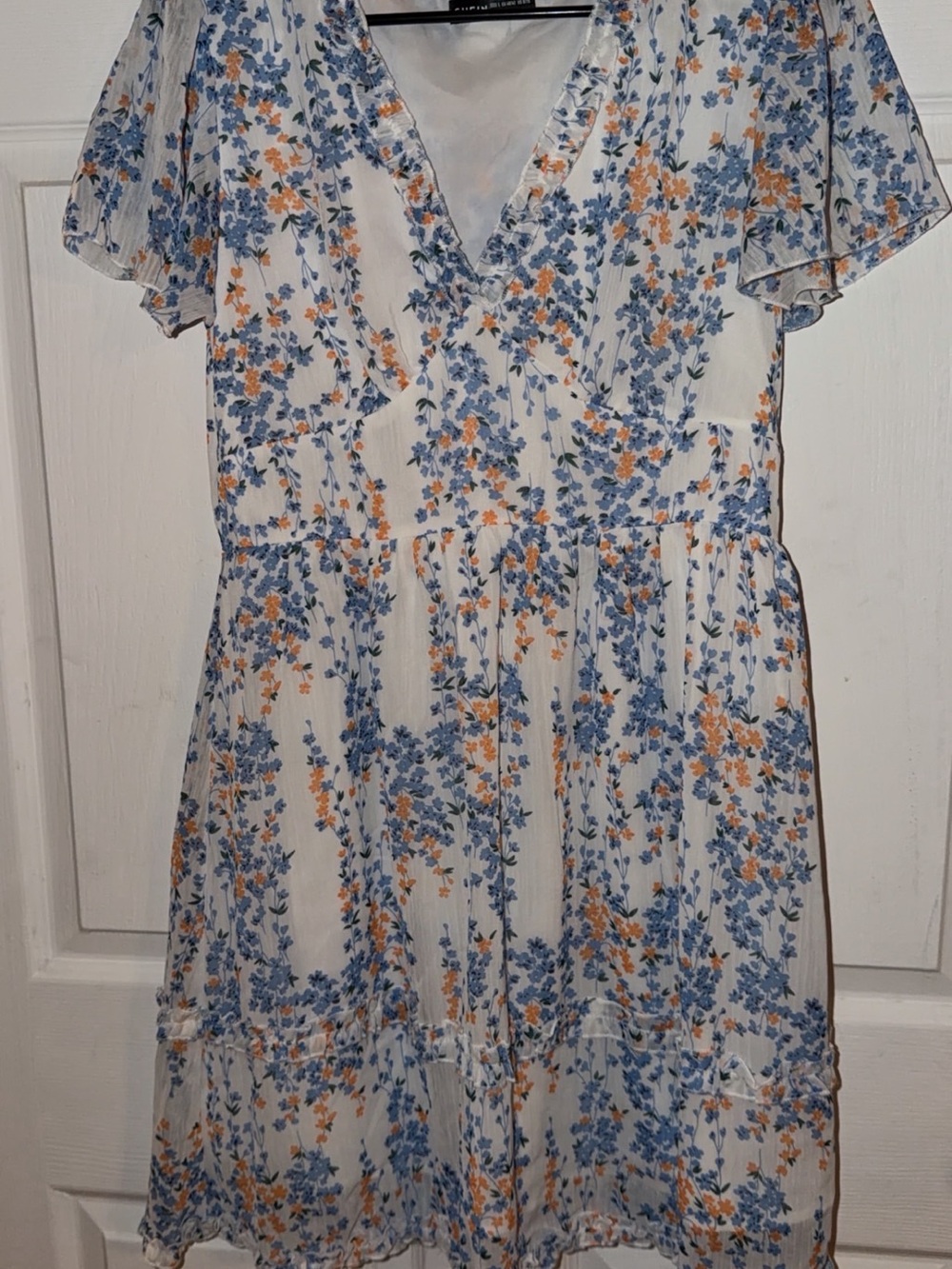 White Floral V-Neck Summer Dress with Blue and Orange Blossoms